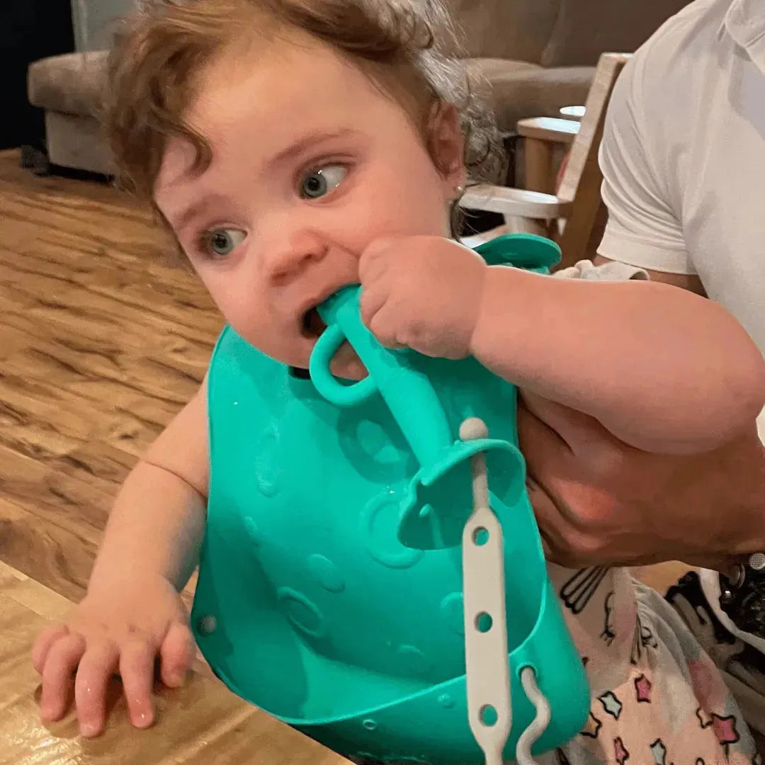 Babador de viagem Stop-Drop + amarras