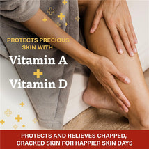 A+D First Aid Multipurpose Ointment advertisement showing a person applying ointment to their leg, highlighting benefits of vitamins A and D.