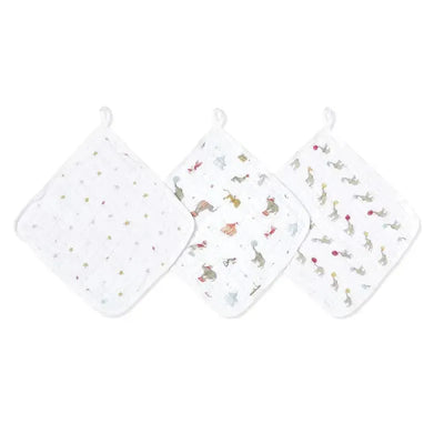 Set of three Aden + Anais washcloths featuring playful elephant circus designs and colorful star accents.