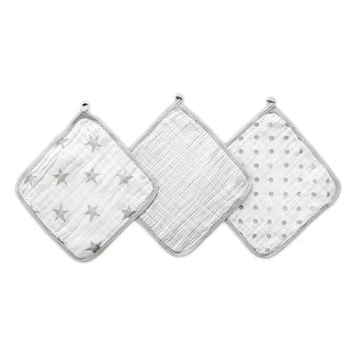 Three Aden + Anais washcloths in dusty gray featuring patterns of stars, stripes, and polka dots, ideal for babies.