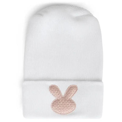 White hospital hat featuring a blush pink woven bunny design. Ideal for newborns.