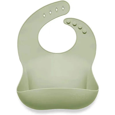 Silicone baby bib in light sage color with a roll-up design and pockets for catching food spills.