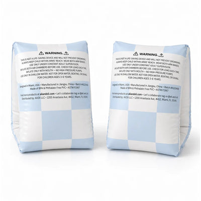Inflatable blue checkered swim arm band wings for children, with safety warnings and usage instructions visible.