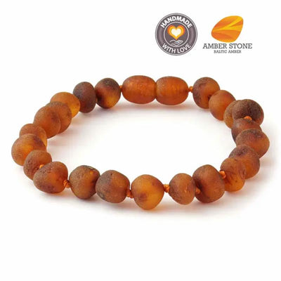 Baroque Baltic amber bracelet with a mix of round and oval beads in warm amber tones.