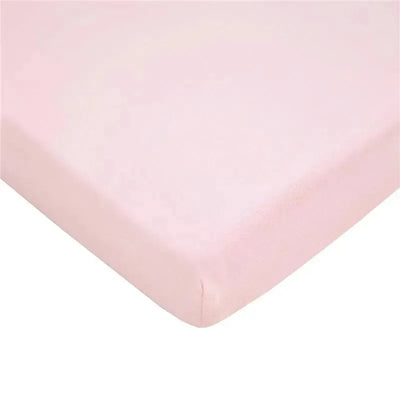 Fitted mini crib sheet in baby pink, made of 100% cotton jersey, designed for portable cribs measuring 24 x 38 inches.