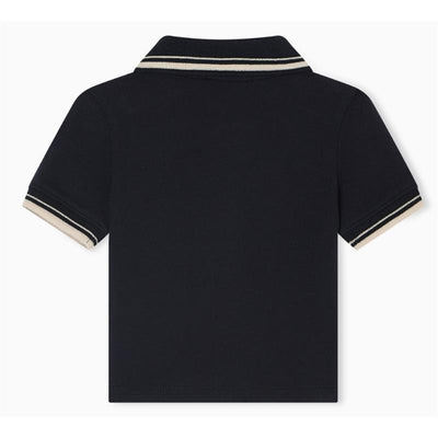 Navy short sleeve polo shirt for baby boy with cream and navy piping details on the collar and sleeves.