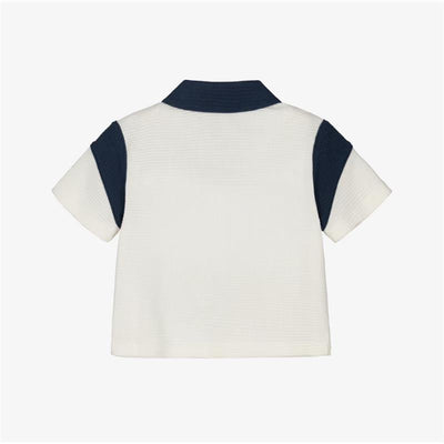 Short-sleeve Armani baby boy polo shirt in white with blue collar and sleeves, featuring a textured fabric.