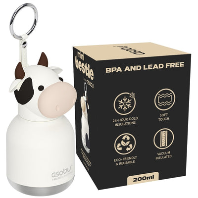 Asobu Bestie Bottle in cow design, featuring a cute animal face and keychain loop, with a box detailing its eco-friendly and insulated features.