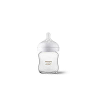 Glass baby bottle by Philips Avent, 4oz, featuring a natural response nipple and clear design.