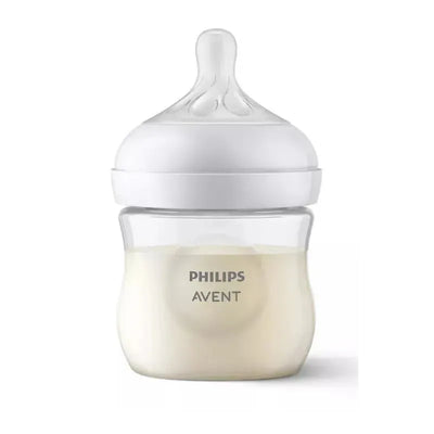 Clear 4oz Philips Avent baby bottle with a natural response nipple, filled with a light liquid, showcasing the brand name.