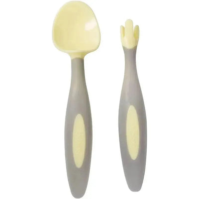 Toddler cutlery set featuring a yellow spoon and a fork, designed for small hands with soft-grip handles.