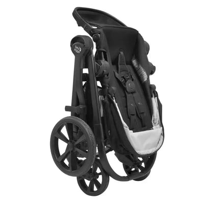 Folded Baby Jogger City Select 2 stroller in Lunar Black color, showcasing its compact design and adjustable seat features.
