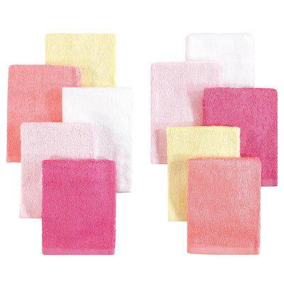 Bamboo washcloths in pink, yellow, and white, arranged in two groups, showcasing soft, luxurious fabrics.