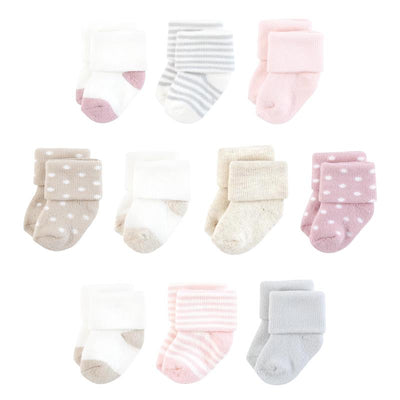 Set of ten pairs of organic terry baby socks in soft pink, white, gray, and beige with various patterns and textures.
