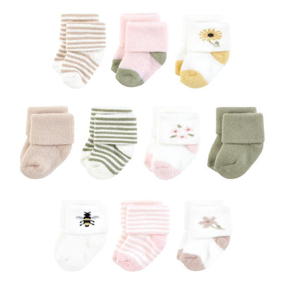 Set of ten organic terry baby socks in soft colors, featuring floral and striped designs with cuffed tops.