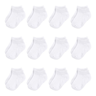 Twelve pairs of white organic cotton socks for girls, featuring a casual design and ribbed cuff.