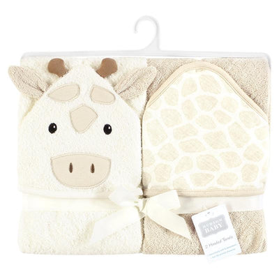 Hooded towel set featuring a beige giraffe design and a second towel with a giraffe print, wrapped with a ribbon.