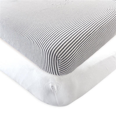 Organic cotton crib sheets in white and heather charcoal stripes, designed for a crib mattress.
