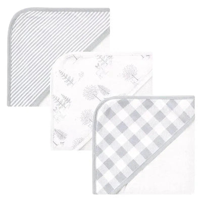 Three organic cotton hooded towels for babies featuring gray woodland themes: striped, forest animals, and checkered patterns.