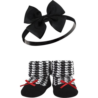 Baby Vision 6Pk Headband & Sock Set featuring a black bow headband and red houndstooth patterned socks with red ribbons.