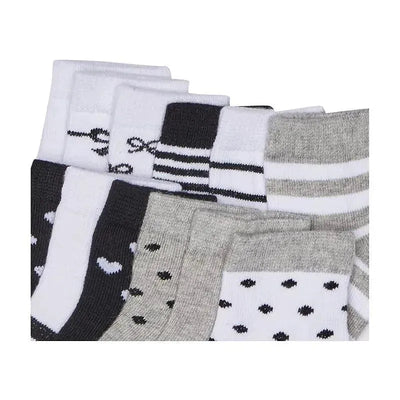 Twelve pairs of baby girl cotton socks in gray and black, featuring various patterns like stripes, hearts, and polka dots.
