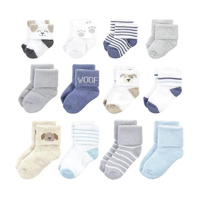 Grow With Me socks set featuring 12 pairs, showcasing various dog-themed designs and colors, ideal for babies.