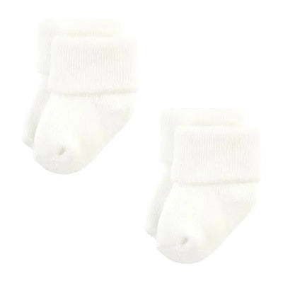 Set of two pairs of baby socks in solid beige and brown colors, featuring a soft, ribbed texture and rolled cuffs.