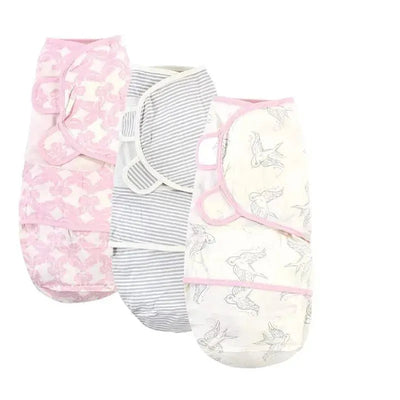 Organic cotton swaddle wraps for babies, featuring pink floral, gray striped, and white bird designs. Suitable for 0-3 months.