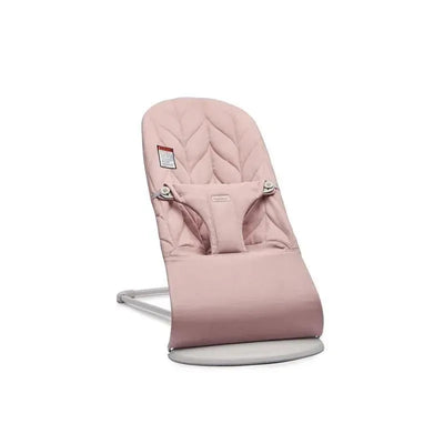 Babybjorn Bouncer Bliss in dusty pink features a quilted fabric seat, adjustable harness, and a sturdy frame.