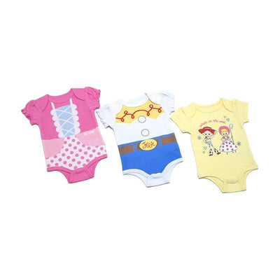 Three baby bodysuits featuring Disney designs: pink with lace, white with Woody’s outfit, and yellow with Jessie and friends.