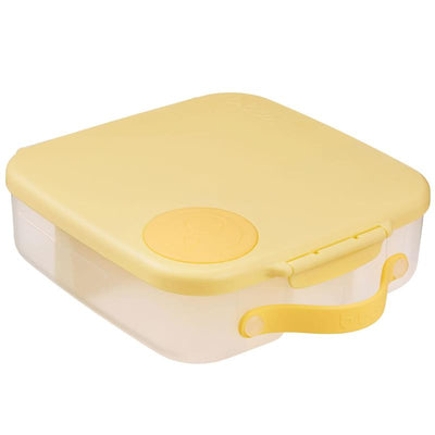 Oversized yellow lunch box for kids with a twist design and a clear base, featuring a secure closure and handle.