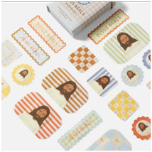 Bandages from the Be A Heart Jesus Heals collection featuring illustrations of Jesus and pastel patterns.