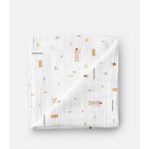 Muslin swaddle baby blanket featuring pastel illustrations of Jesus and Christian symbols on a white background.