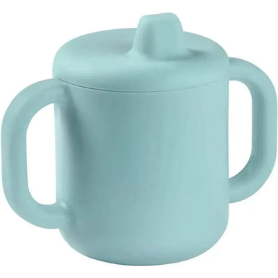 Silicone training cup in soft blue color with two handles and a secure lid, designed for toddlers.
