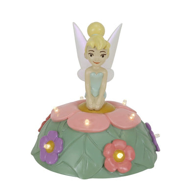 Tinker Bell figurine on a colorful flower-themed table lamp, featuring pink, green, and flower embellishments.
