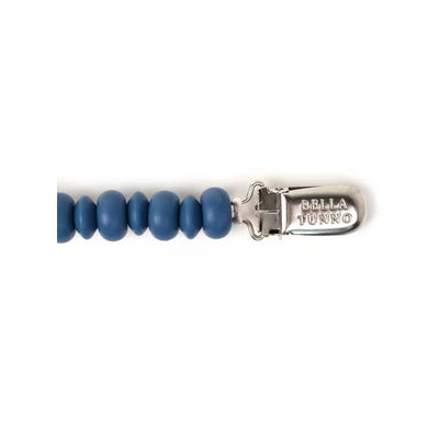 Azure silicone pacifier clip by Bella Tunno, featuring rounded beads and a metal clip with brand logo.