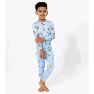 Bamboo kids pajamas featuring Spongebob Squarepants characters on a blue background, worn by a smiling child.