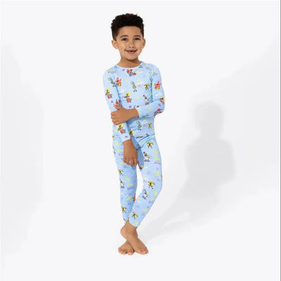 Bamboo kids pajamas featuring Spongebob Squarepants characters, worn by a smiling child.
