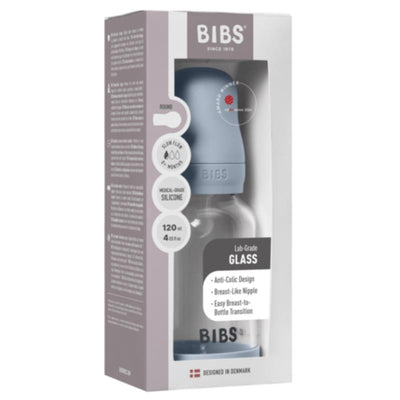 Baby blue silicone glass bottle in packaging, labeled as Bibs, features anti-colic design and breast-like nipple.