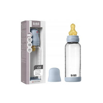 Baby blue 8oz glass bottle by Bibs with a natural rubber nipple and bumper, displayed in its packaging.