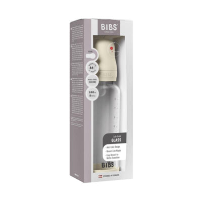 BIBS 8oz silicone glass baby bottle in ivory color, featuring anti-colic design and breast-like nipple, displayed in packaging.