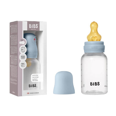 Baby blue plastic bottle with natural rubber latex nipple, 150ml capacity, displayed next to its packaging.