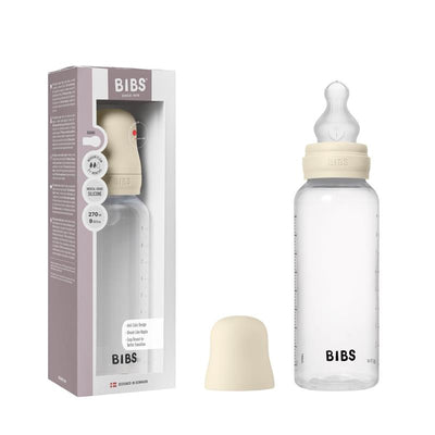Baby plastic bottle with silicone nipple in ivory, 270ml capacity, with packaging displaying product details.