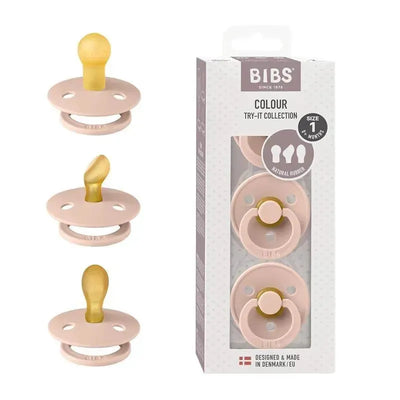 BIBS pacifiers for 0-6 months, three-pack in blush, with BPA-free symmetrical nipples and natural rubber.