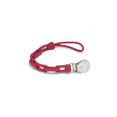 Silicone pacifier clip in ruby red, featuring a textured silicone strap and a metallic clip for secure attachment.
