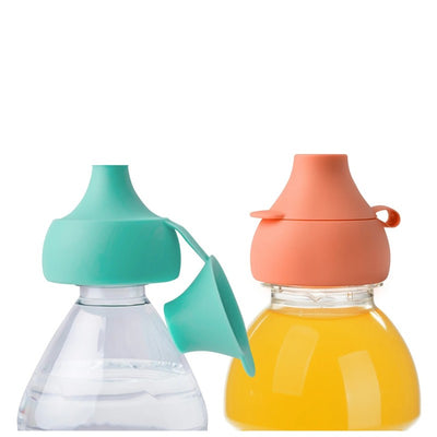 Boon SNUG Silicone Bottle Toppers in mint green and coral, designed for spill-proof sealing of beverage bottles.