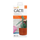 Boon Cacti Bottle Cleaning Brush Set featuring four unique brushes in a cacti design, displayed in a brown vase.