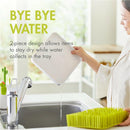 Green Boon Grass Countertop Drying Rack shown with a woman pouring water into a sink, highlighting its drying features.