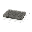 Gray and white Boon LAWN countertop drying rack, featuring upright pegs for drying dishes, measuring 13.5 x 11 x 2.4 inches.