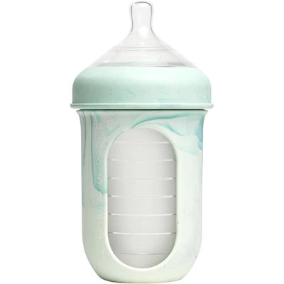 Boon Nursh 8 oz baby bottle in mint tie dye, featuring clear measurement markings and a soft silicone design.